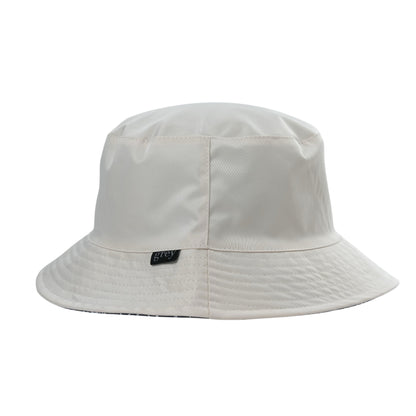Grey By Ortenhill Avery Reversible Bucket Hat (Beige with Logo on Navy)